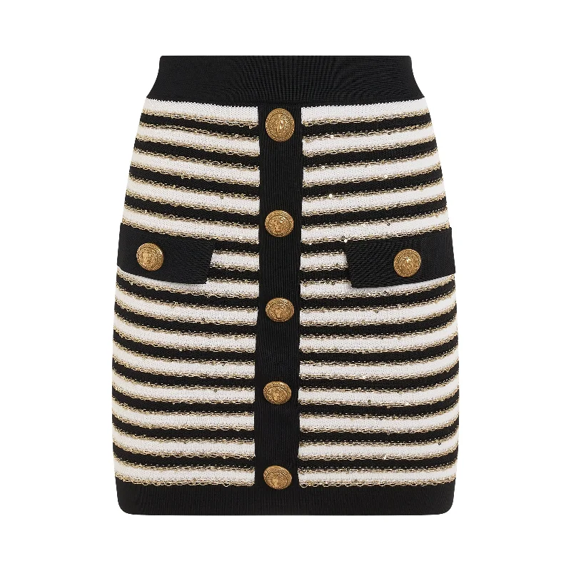 Metallic Bucket Bag in Rose Gold with Chain Strap for a Trendy Party LookButtoned Striped Knit Skirt in Black/White/Gold