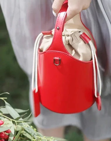 Suede Bucket Bag in Burgundy with Tassel Trim for a Boho - Chic VibeCute Red Womens Leather Small Bucket Handbag  Black Small Barrel Shoulder Purse for Ladies