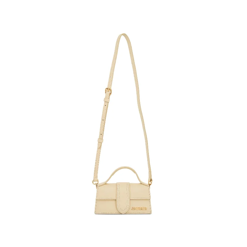 Linen Bucket Bag in Natural Beige with Braided Strap for a Rustic Summer EnsembleLe Bambino Leather Bag in Ivory