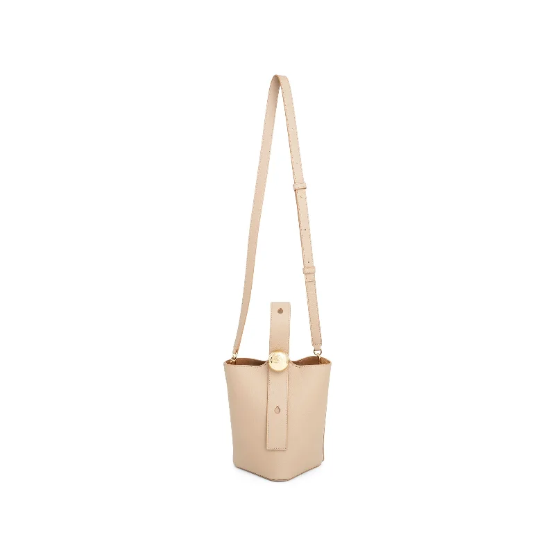 Faux Fur - Lined Bucket Bag in White for a Cozy Winter AccessoryMini Pebble Bucket Bag in Sand