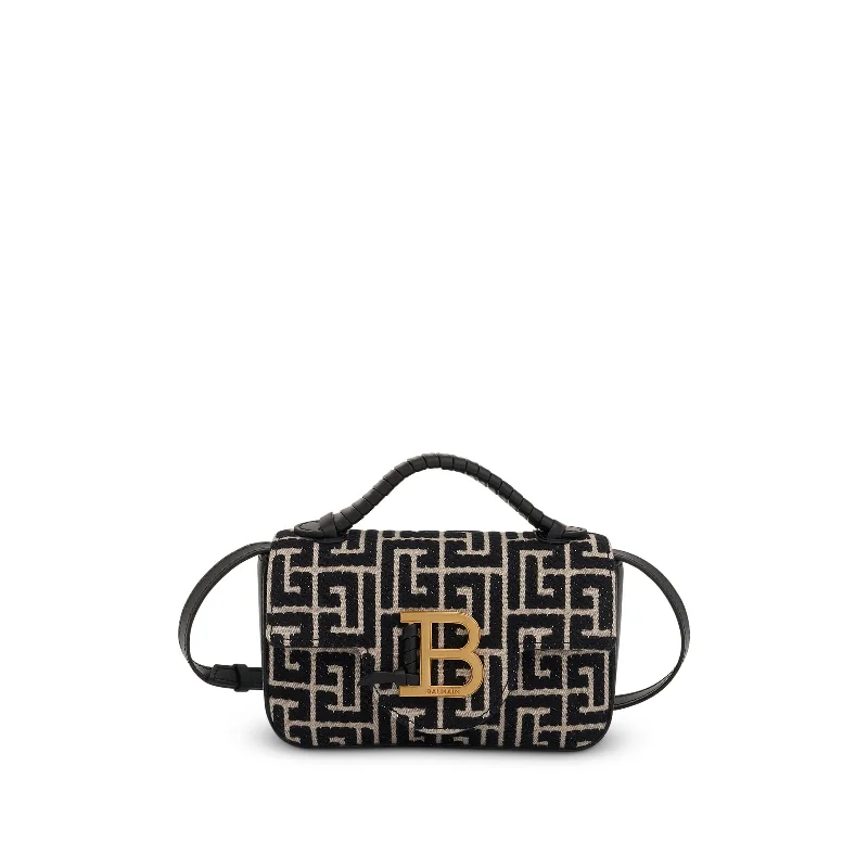 PVC Bucket Bag in Clear with Glitter Accents for a Fun and Edgy StyleMonogram Jacquard Mini Bag in Ivory/Black